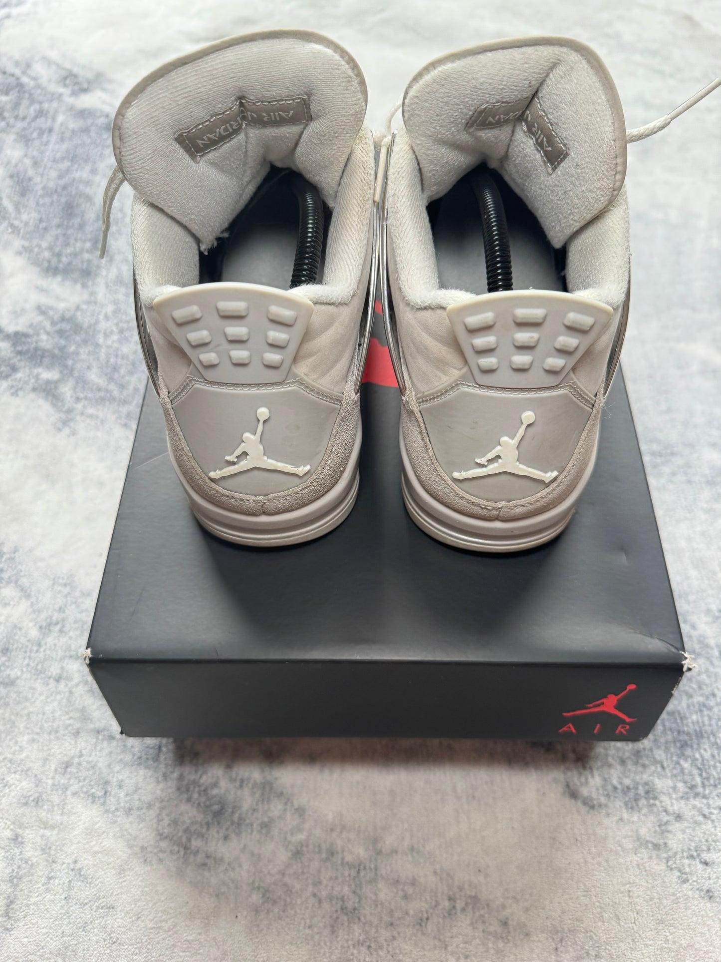 Jordan 4 Frozen Moments